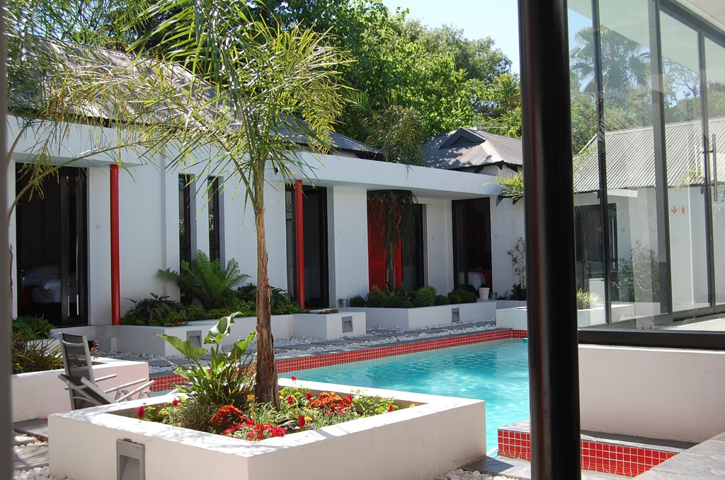 Rooms overlooking sparkling pool